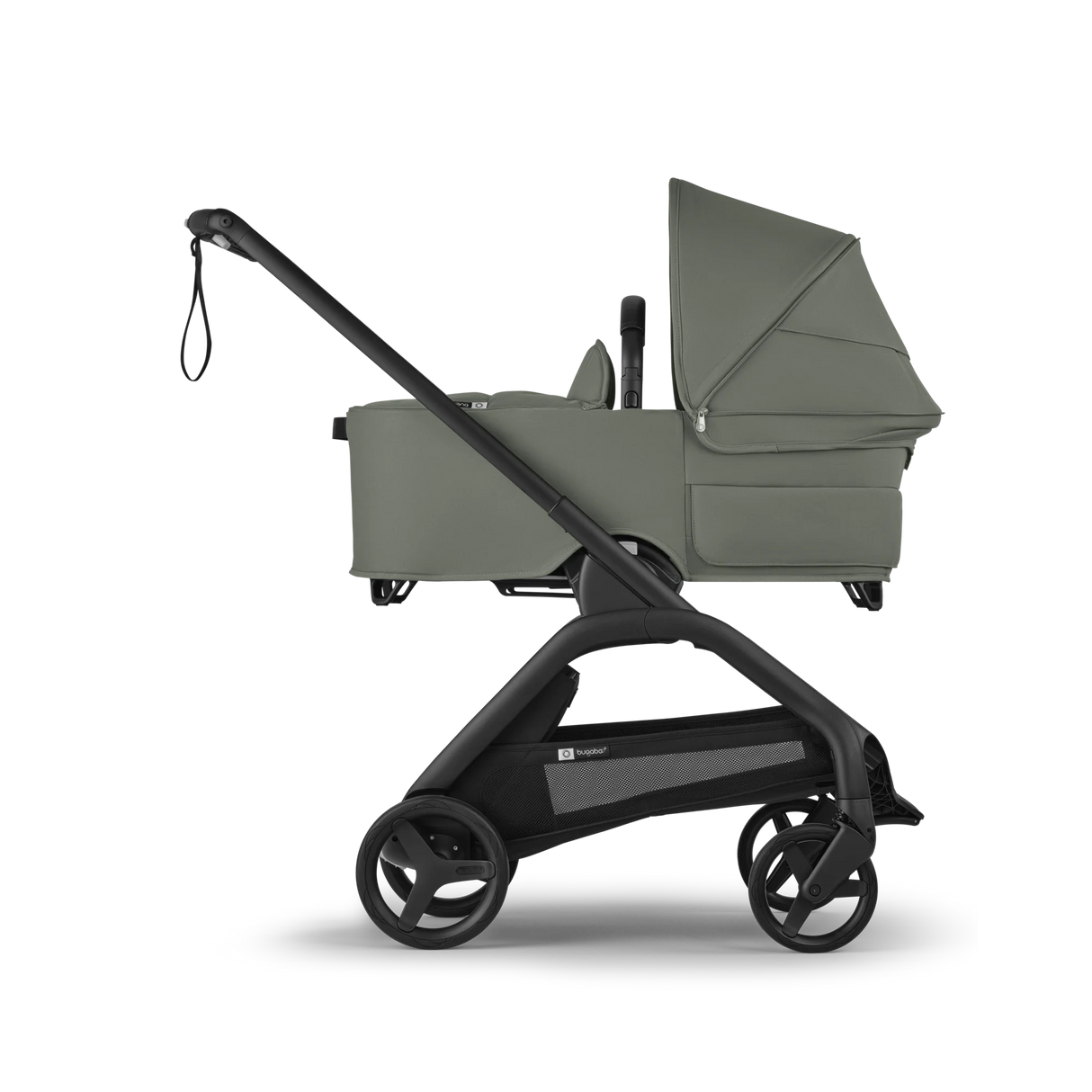 Bugaboo Dragonfly liggdel komplett i skogsgrön monterad på barnvagnen