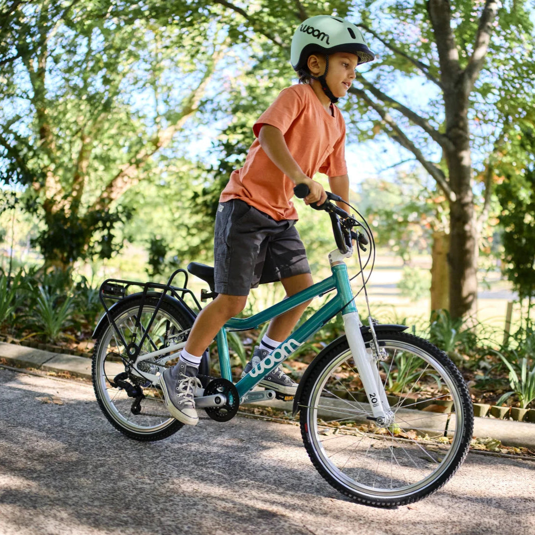 Barncykeln Woom Go 4 med 20-tumshjul för barn mellan 6 och 8 år